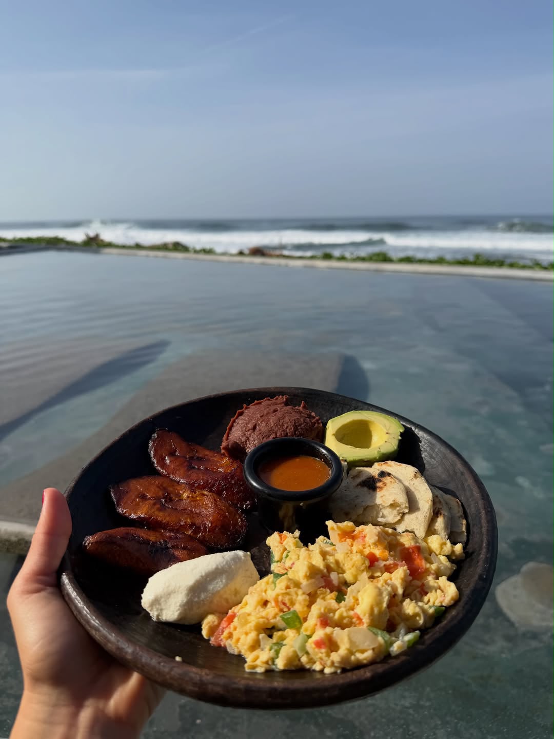 Fresh Salvadoran breakfast served beside the oceanfront pool
